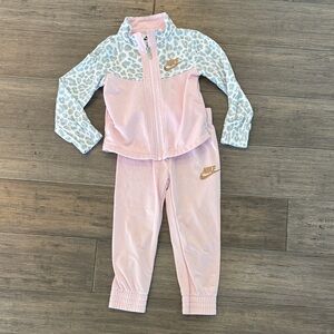 Girls nike track suit.